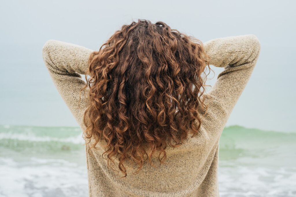 curly hair at the beach